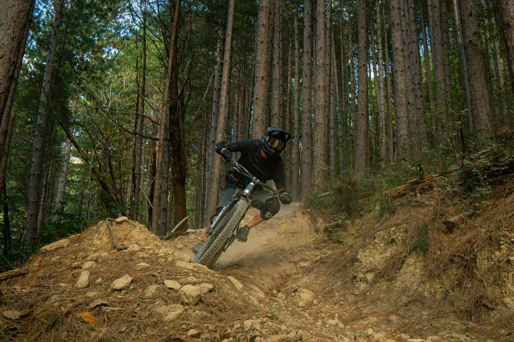 mountainbike in a corner on Revenant Trail in Finale Ligure during The Classic bike shuttle tour